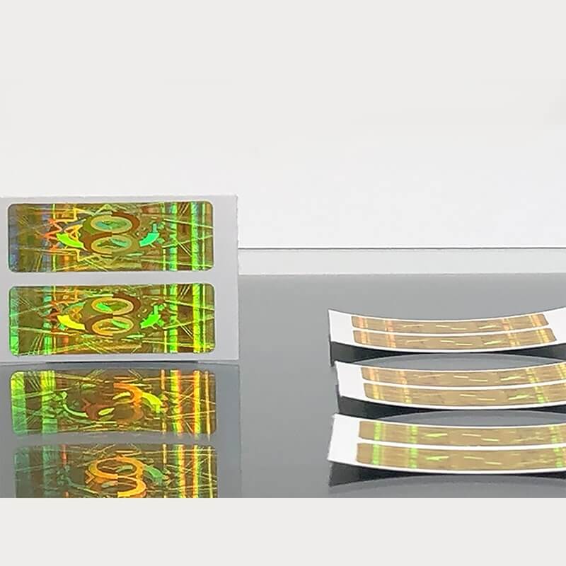 EMF Protection Strips displayed on a reflective surface with vibrant colors and patterns.